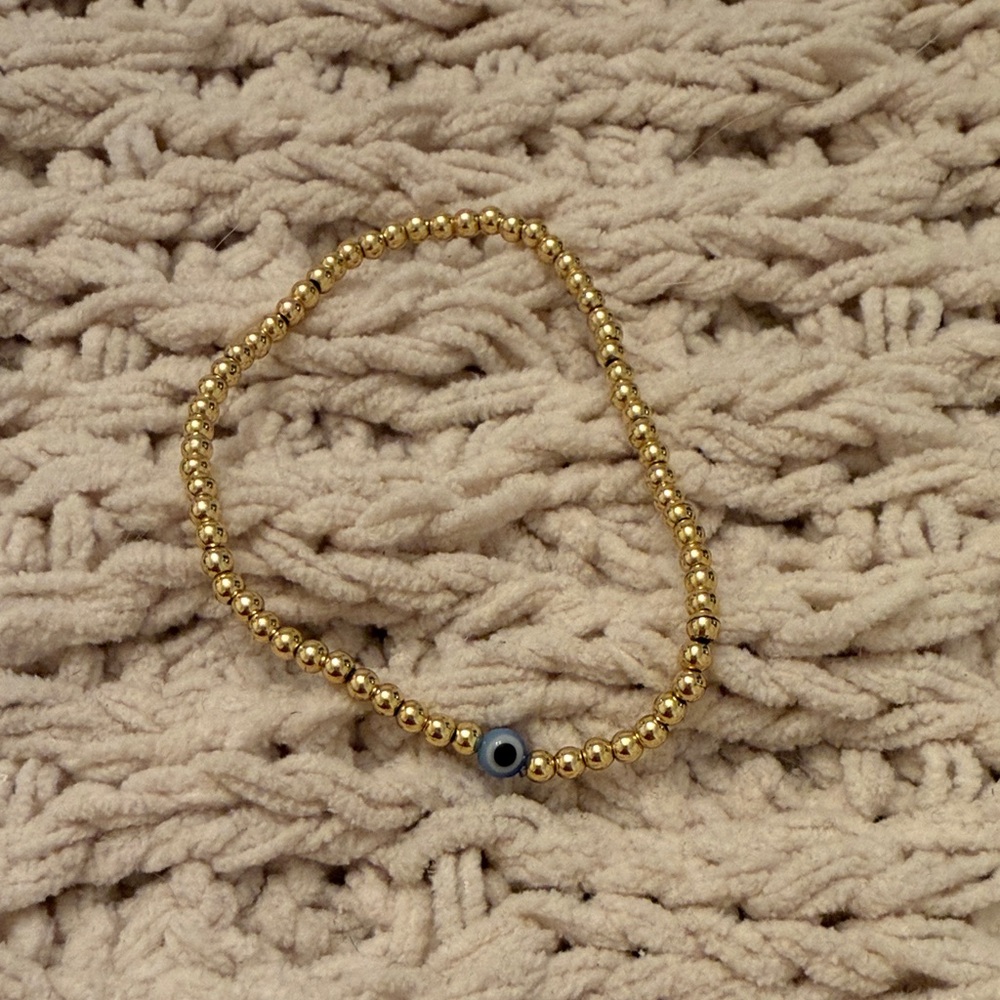 Gold Beaded Bracelet with Blue Evil Eye Accent